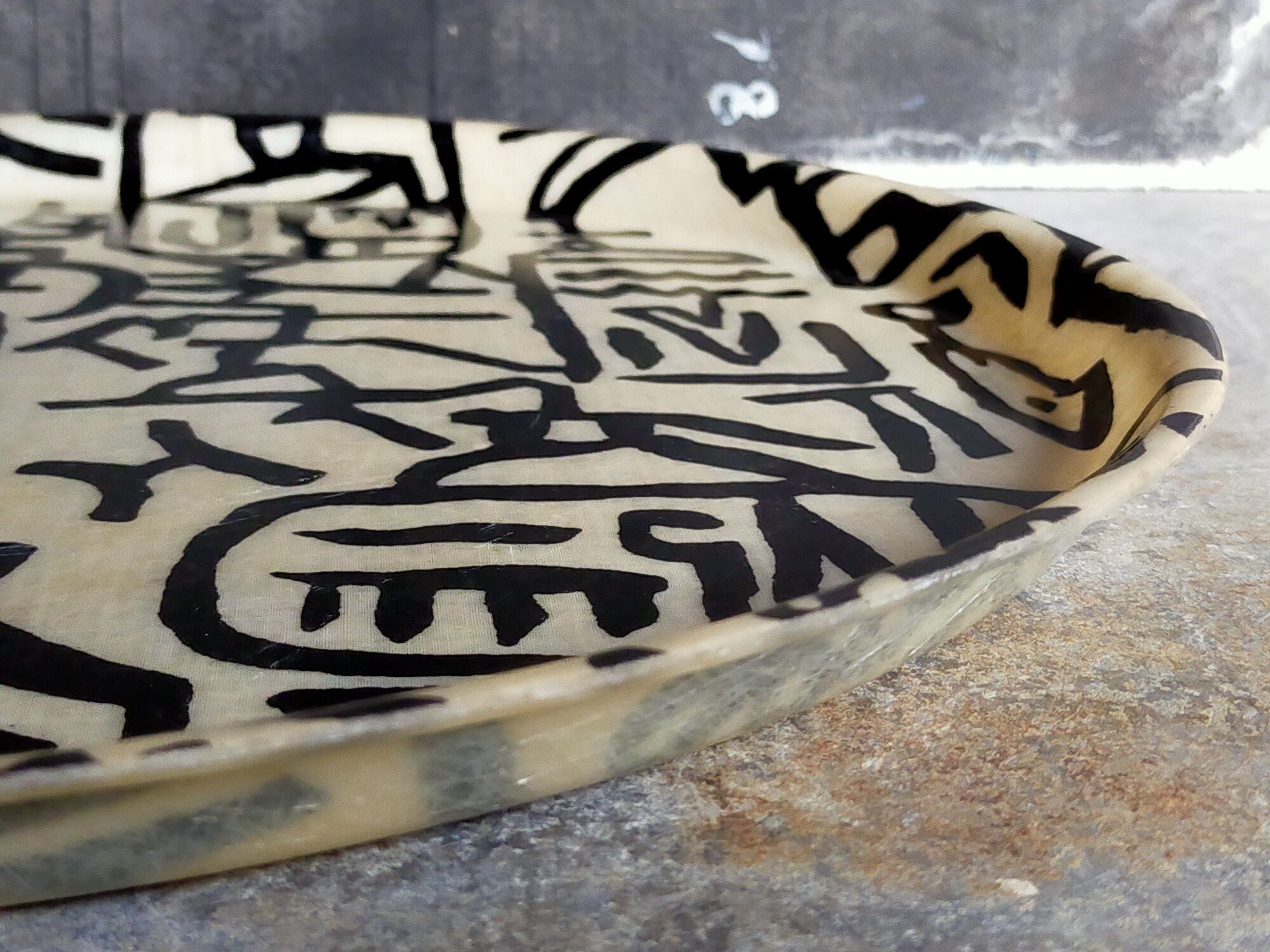 Vintage fiberglass tray with graphic patterns