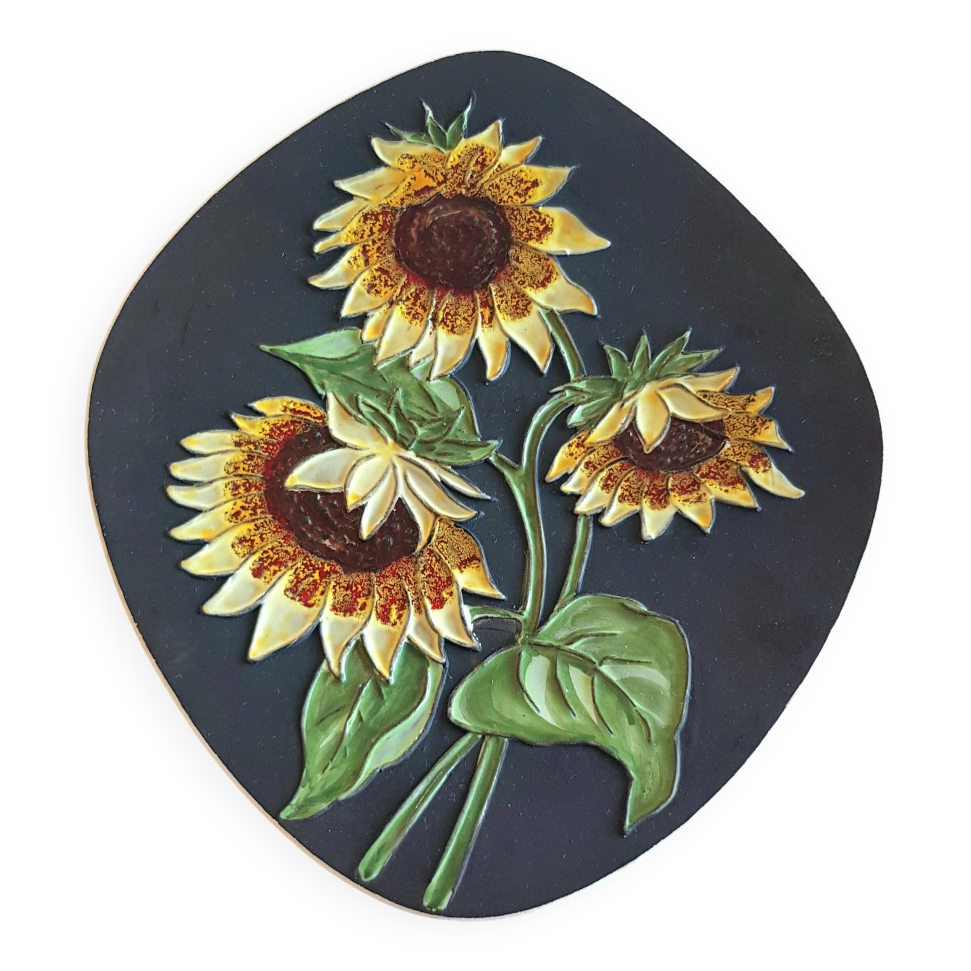 Decorative wall plate with sunflowers.