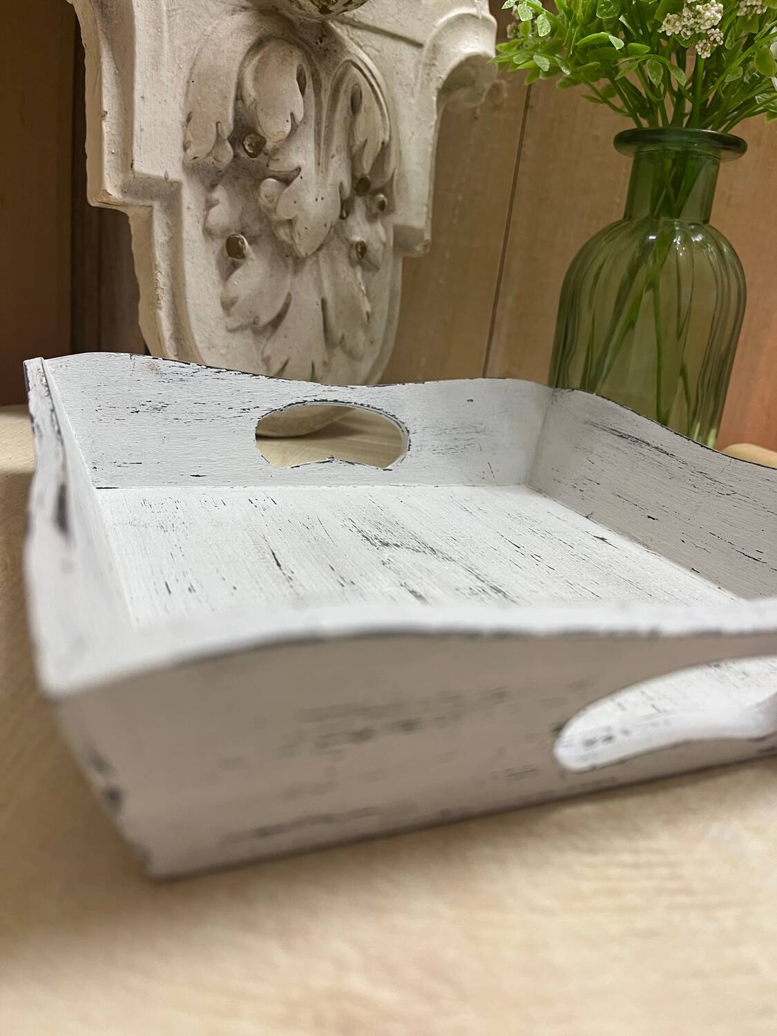 Old wooden tray with aged white patina