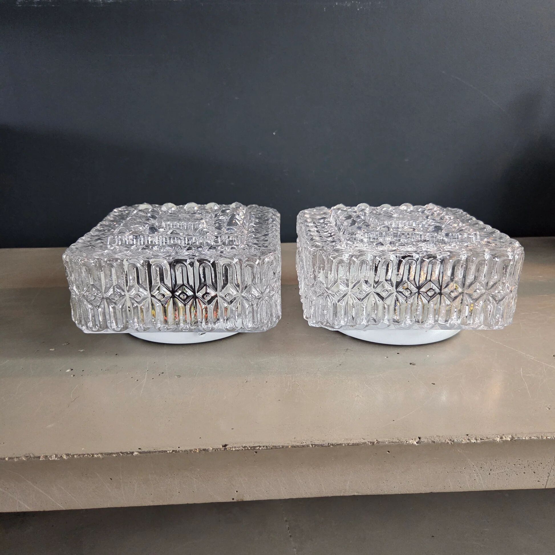 Pair of ceiling lights or moulded glass wall lights.