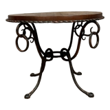 Hammered iron coffee table with circular wooden top