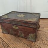 Old Indian wooden wedding chest decorated with chiseled brass plaque. India late 19th/early 20th