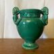 Antique green ceramic vase with handles