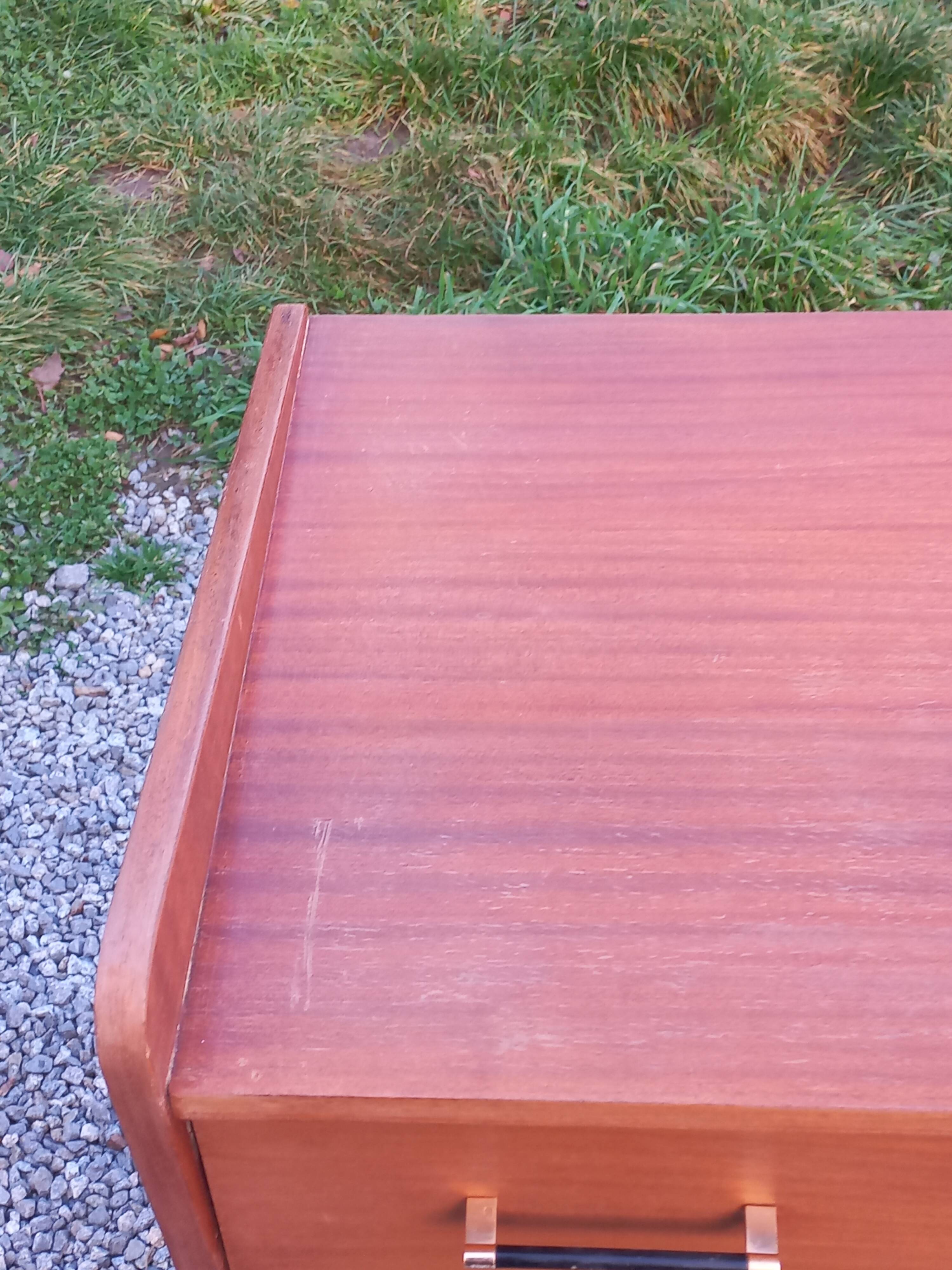 Vintage mahogany commode with metal tapered legs, 4 drawers, 1950s.