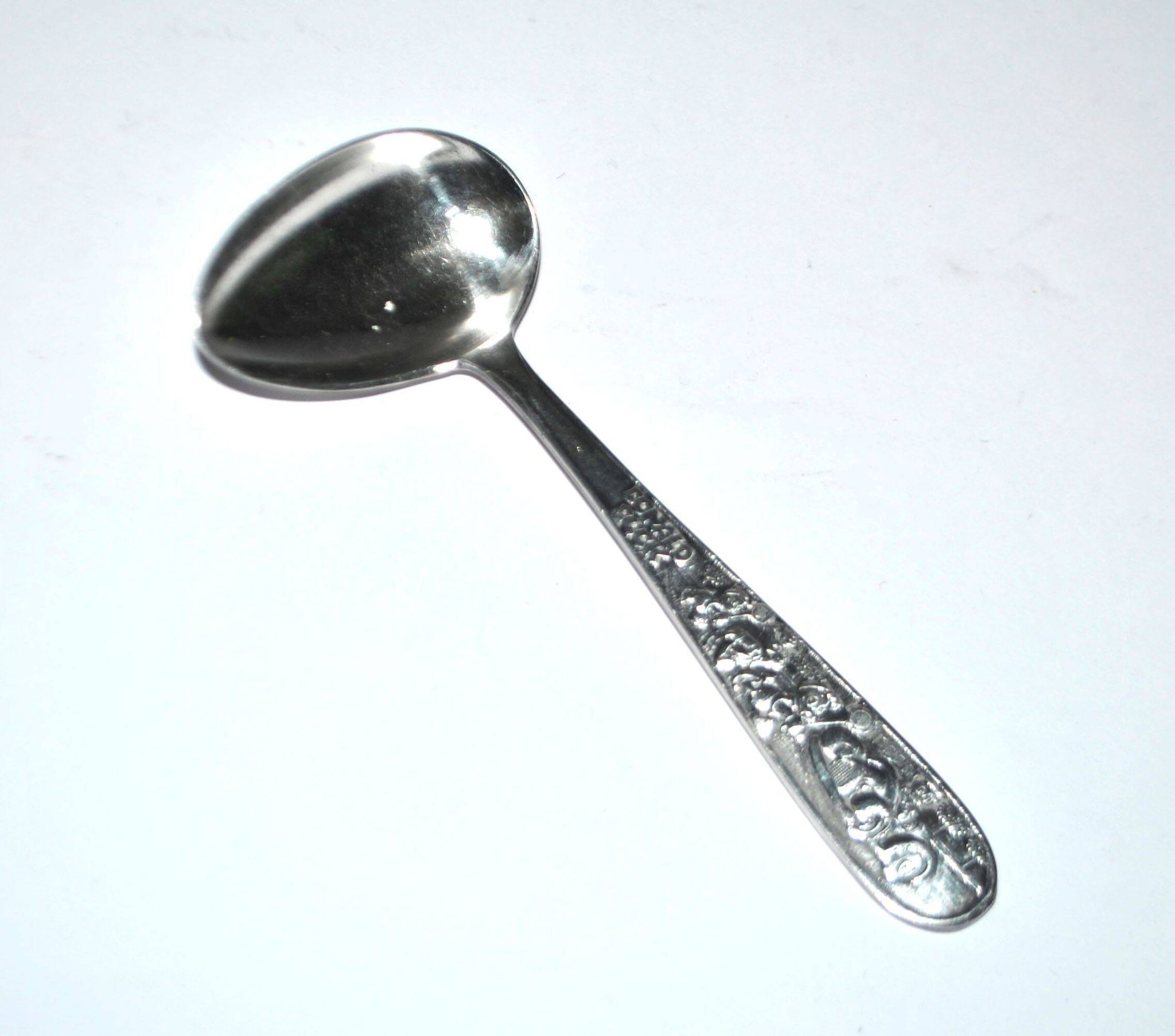 Vintage silver-plated metal porridge spoon, Donald Duck cutlery for children