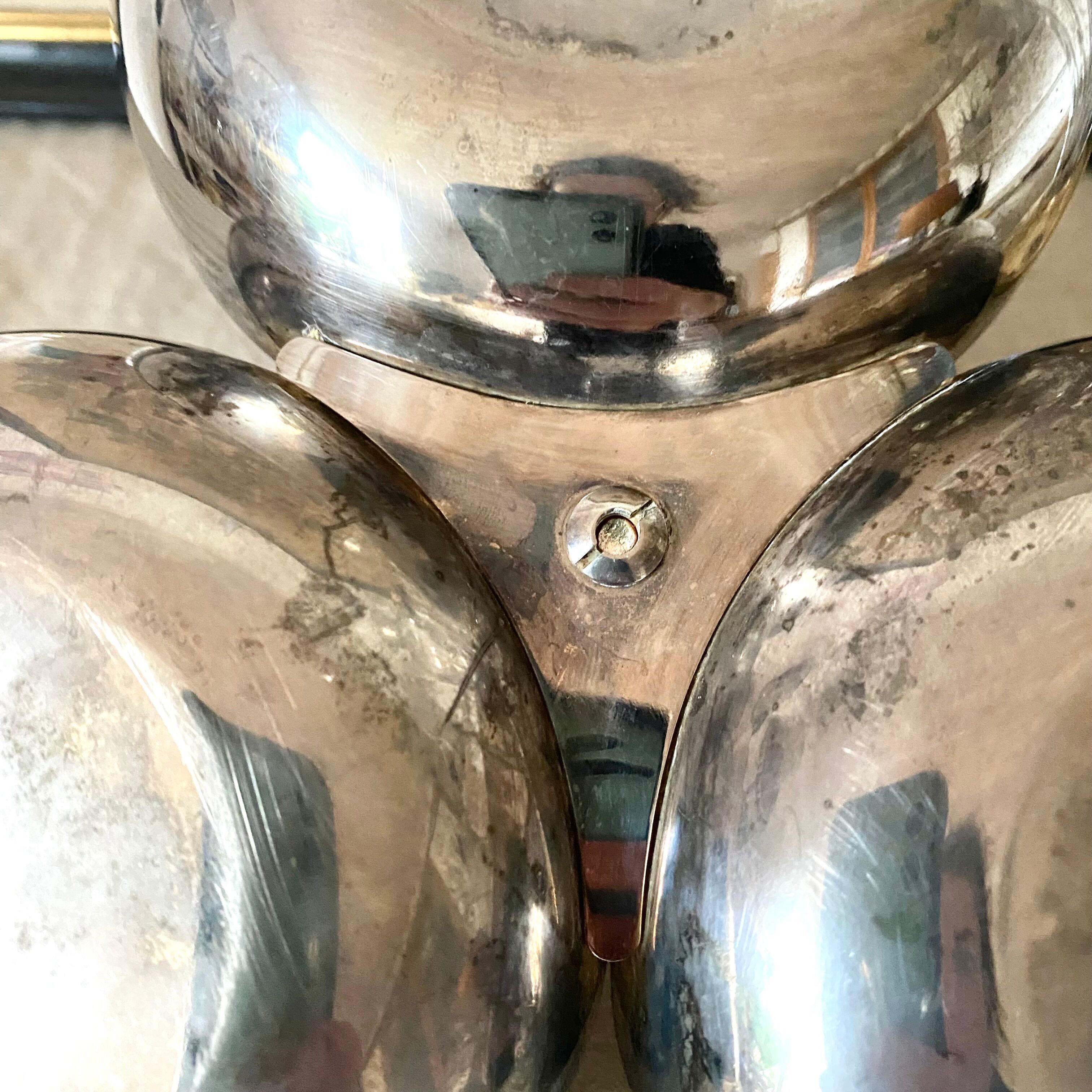 Servant in silver metal pine cone