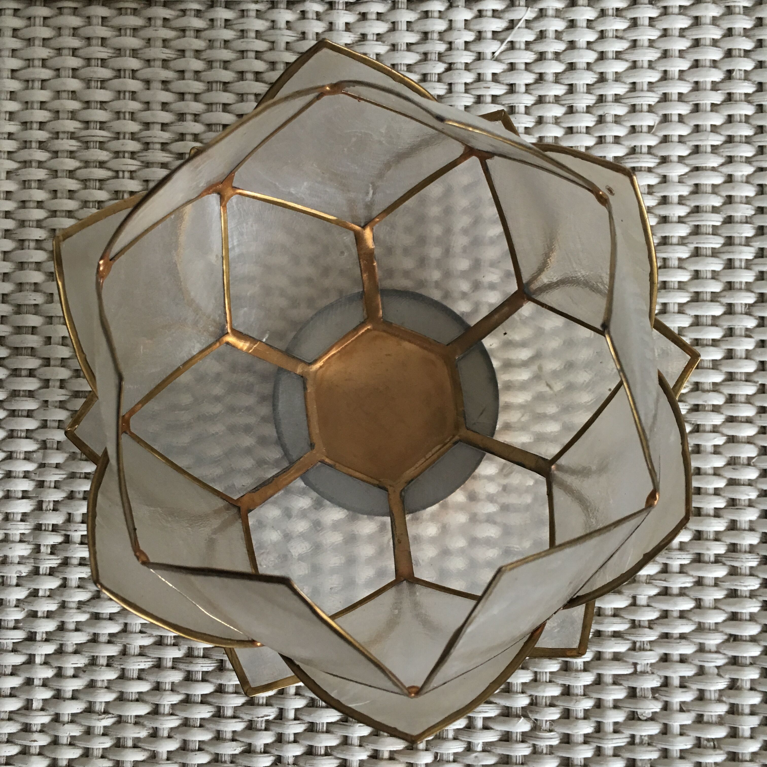 Candlestick or candle holder in nacre flower shape