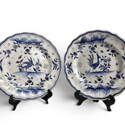 Moustiers, pairs of plates with wading bird design, scalloped edge, early 20th century.