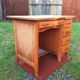 Vintage oak desk with 5 drawers and 1 pull.