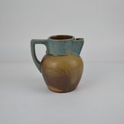 Two-tone stoneware pitcher by Louis Lourioux