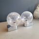 Pair of vintage wall lights in chrome metal with bubbled glass globes.