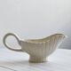 White asparagus slushy gravy boat.