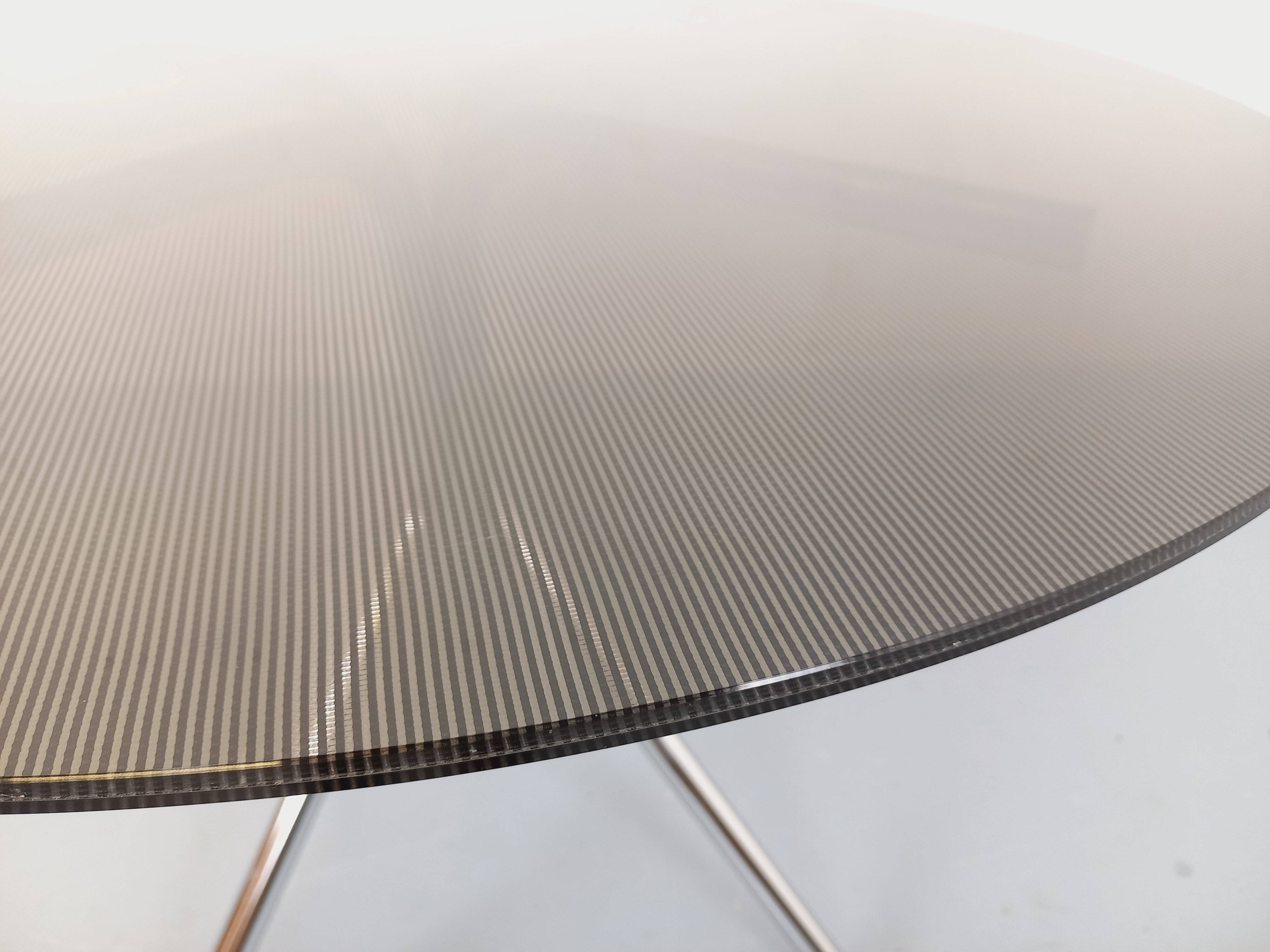 Vintage dining table in smoked glass plexiglass and chrome metal.
