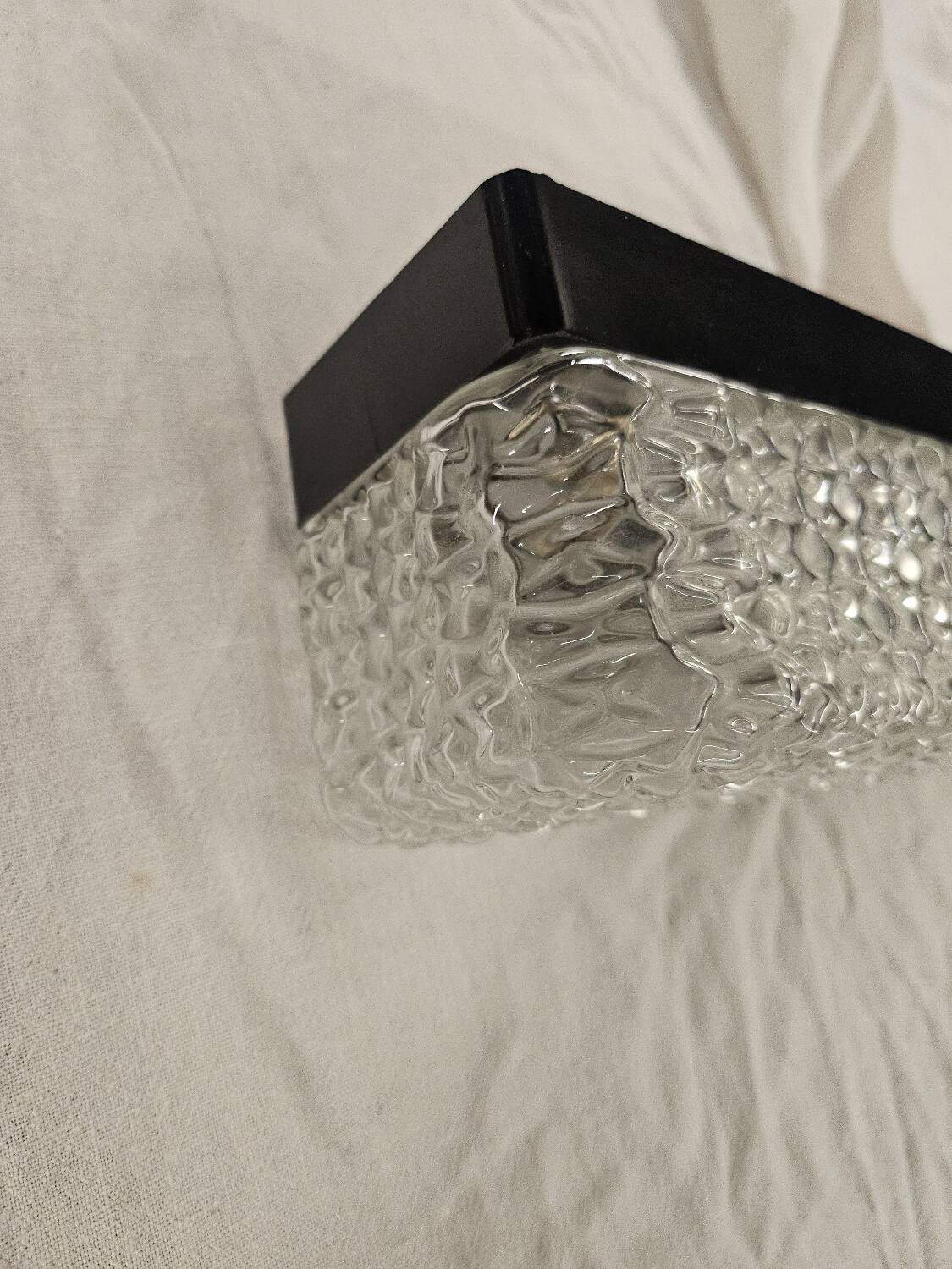 Hammered glass wall light