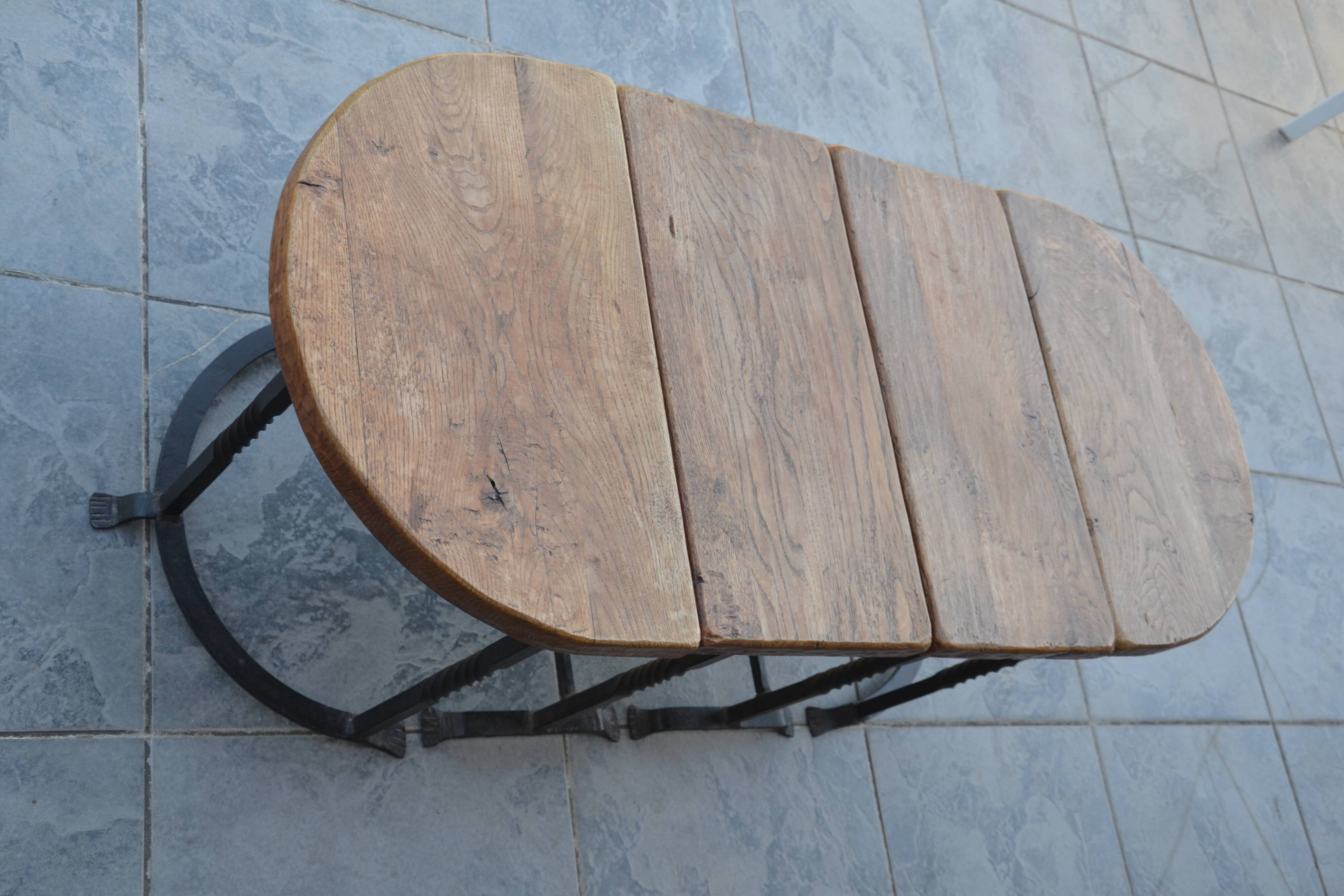 Unusual modular coffee table in oak and wrought iron.