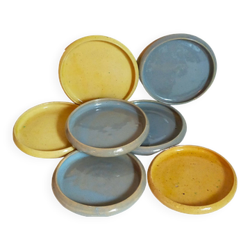 Seven vintage potter's sweet treat plates