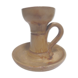 Candlestick in sandstone, cellar rat