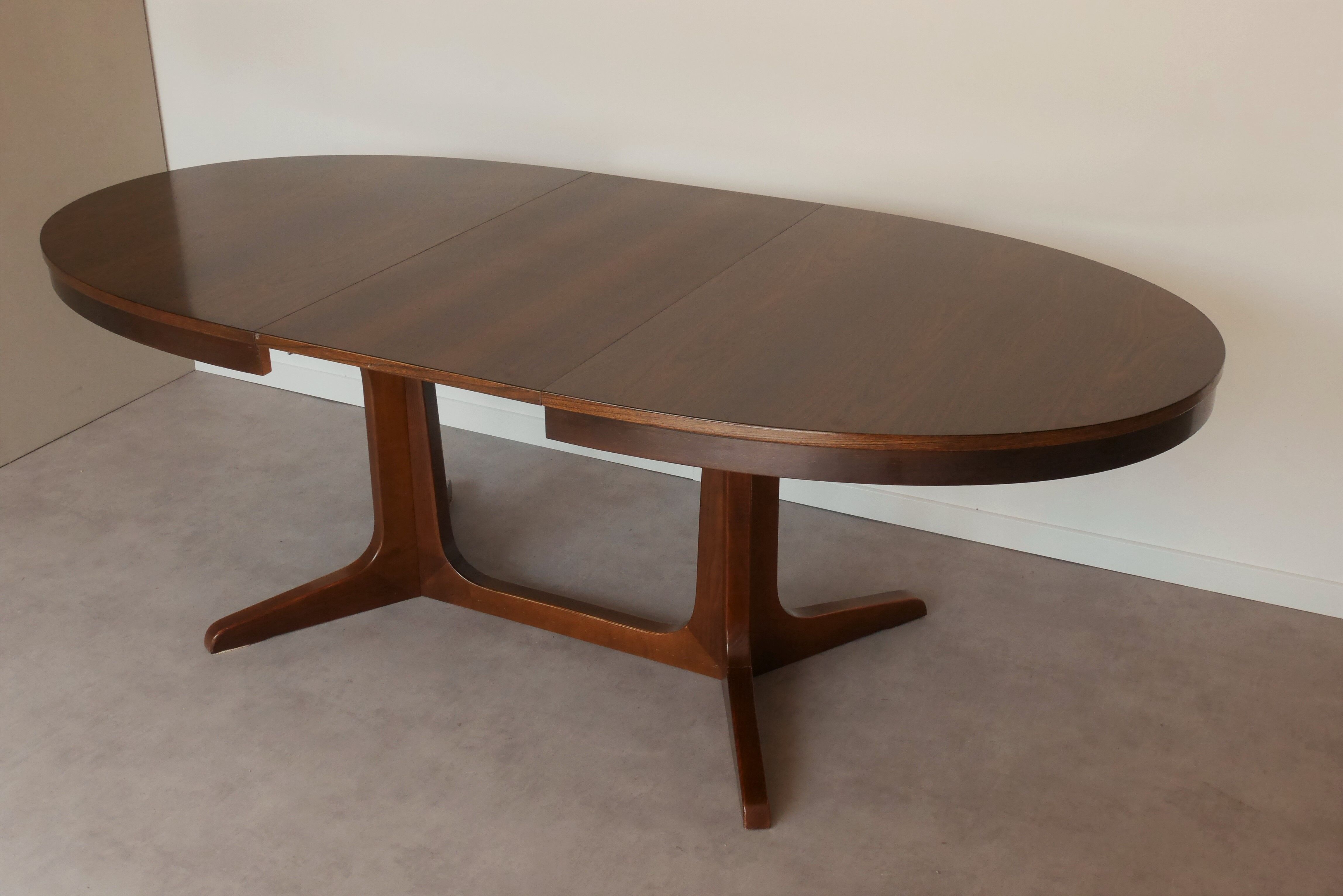 Scandinavian style oval table in central foot with extensions