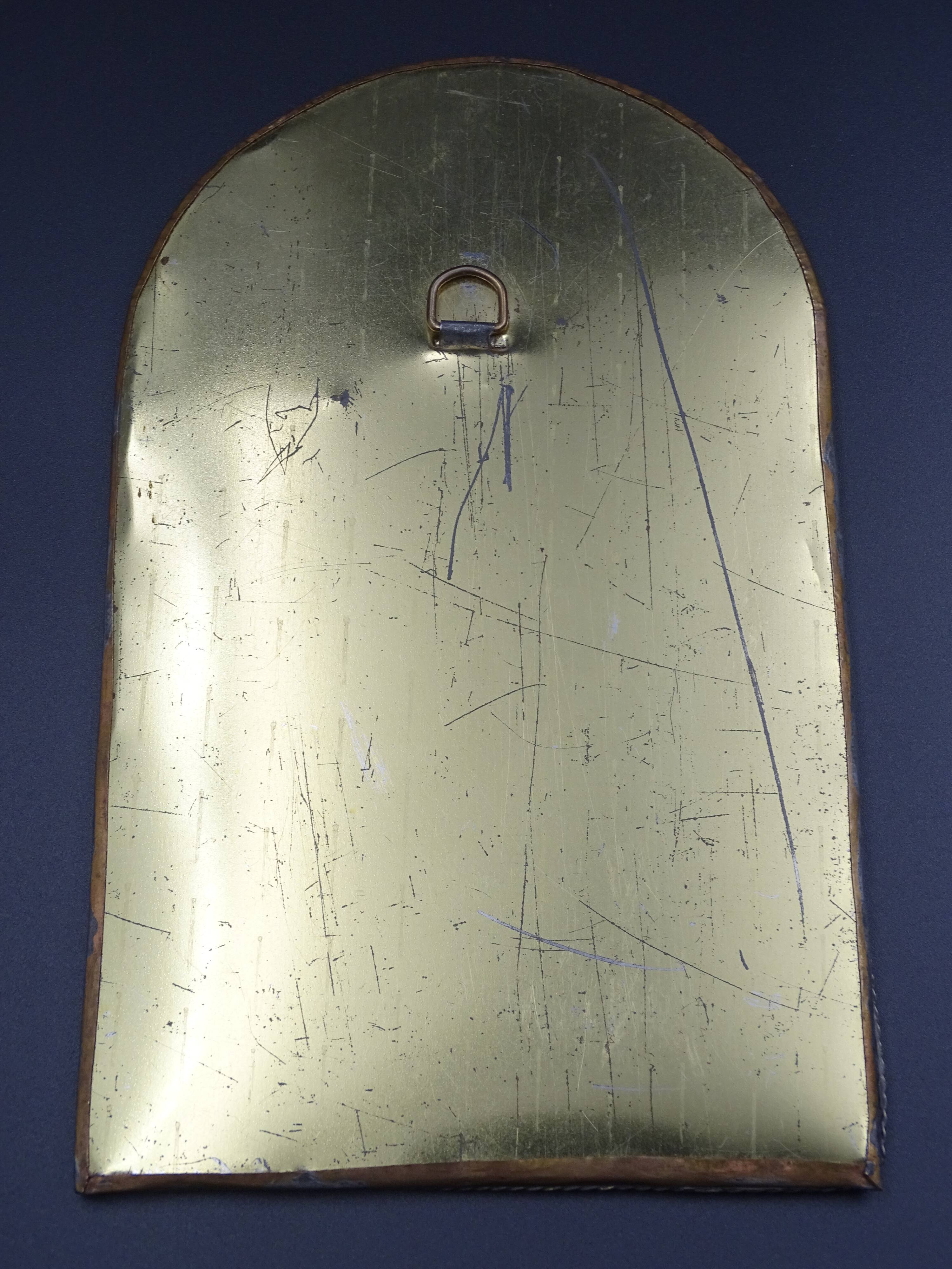 Oriental mirror in worked copper 24x15cm