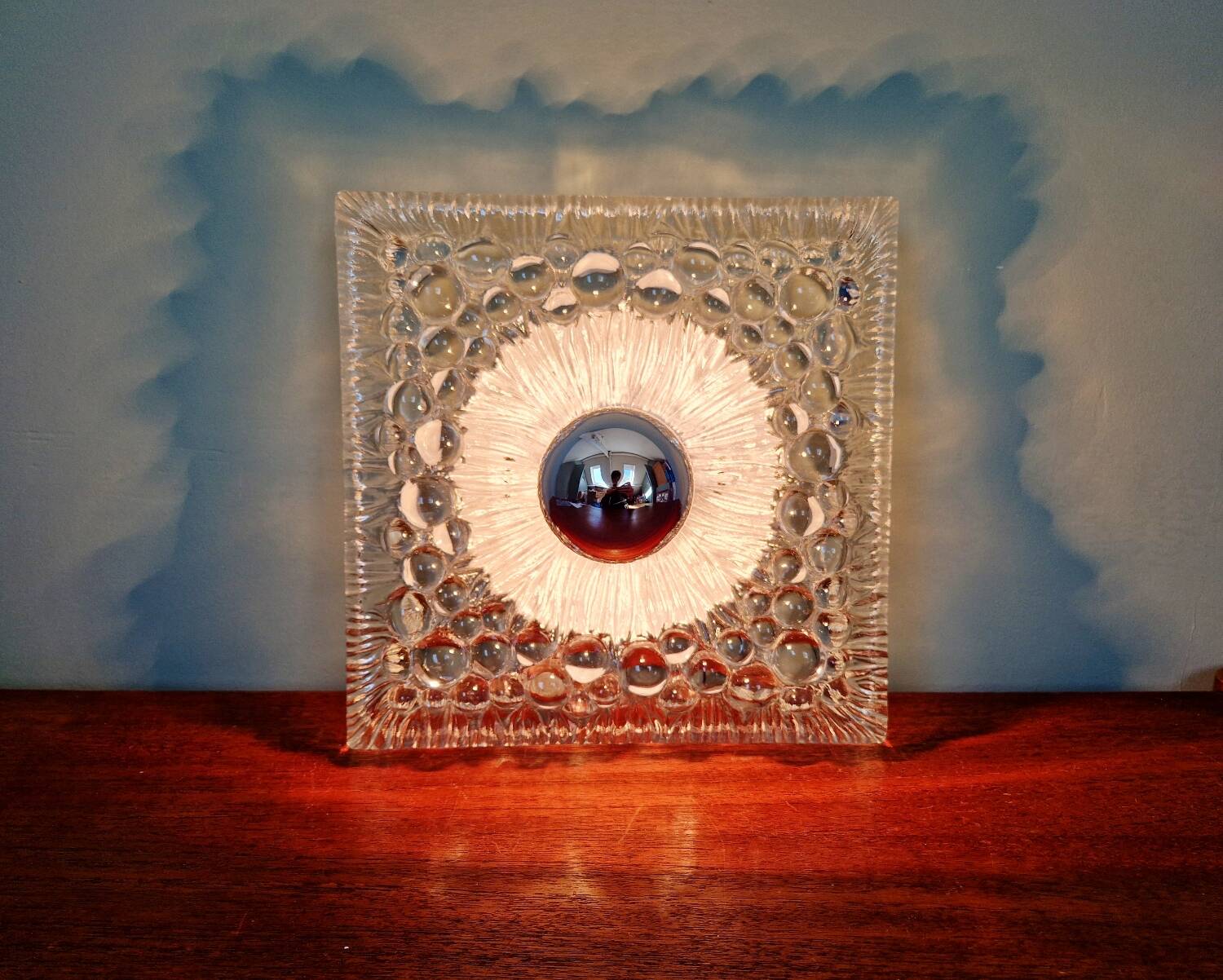 Space Age wall light in pressed transparent moulded glass, 1970.