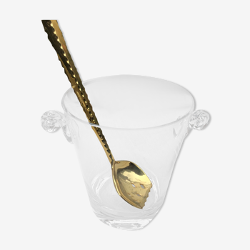 Ice bucket and golden spoon