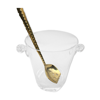 Ice bucket and golden spoon