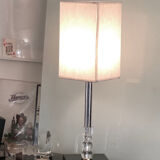 Silver floor lamp with a straight shade.