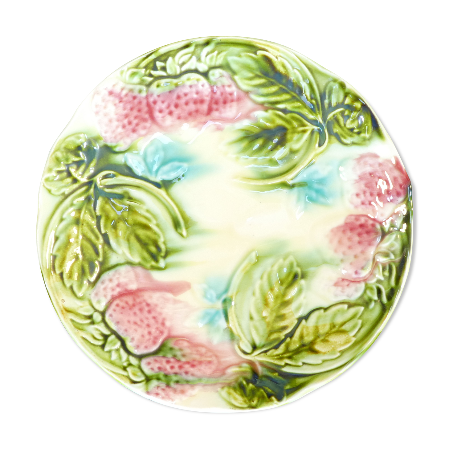 Plate in slurry with strawberry decoration and strawberry leaf