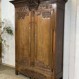 19th-century Norman wedding armoire in blonde oak.
