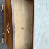 Antique 19th-century wooden chest of drawers with a marble top
