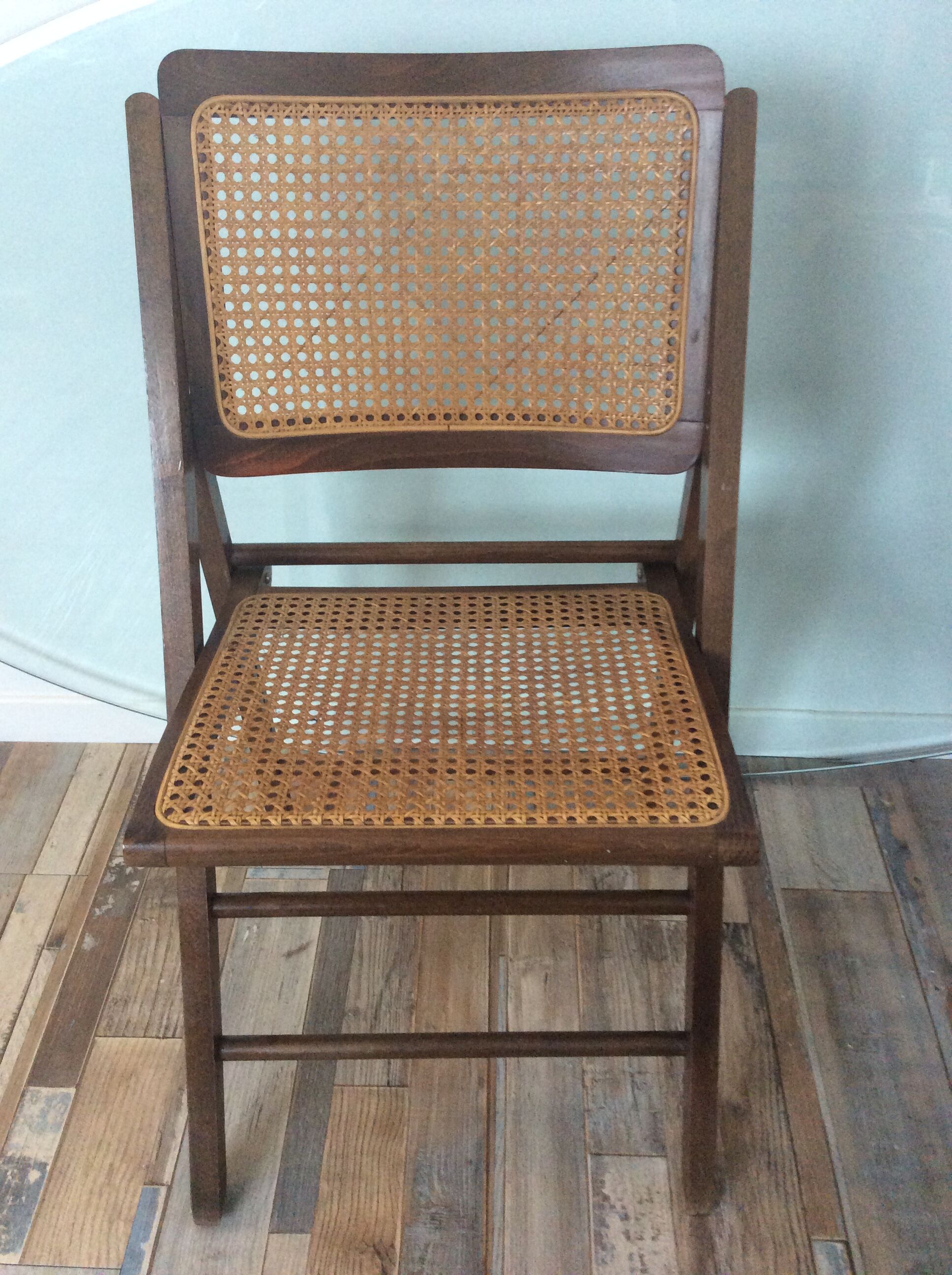 Folding chair caned from the 70s