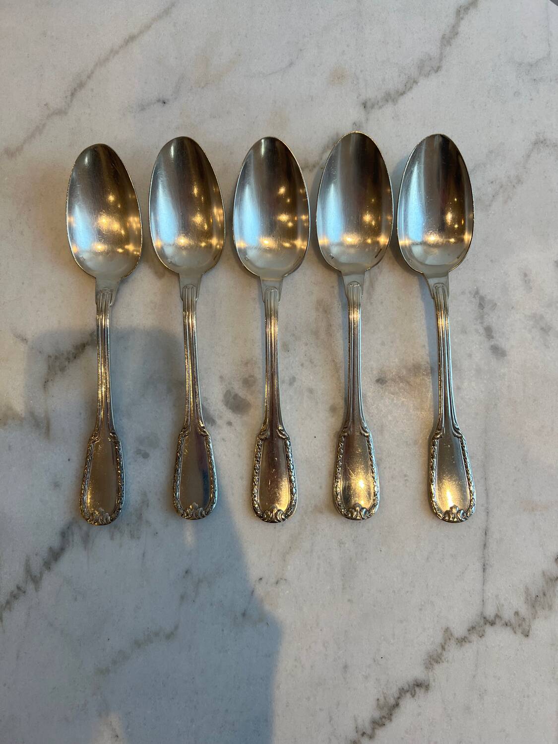 Set of five Bonlanger silver spoons