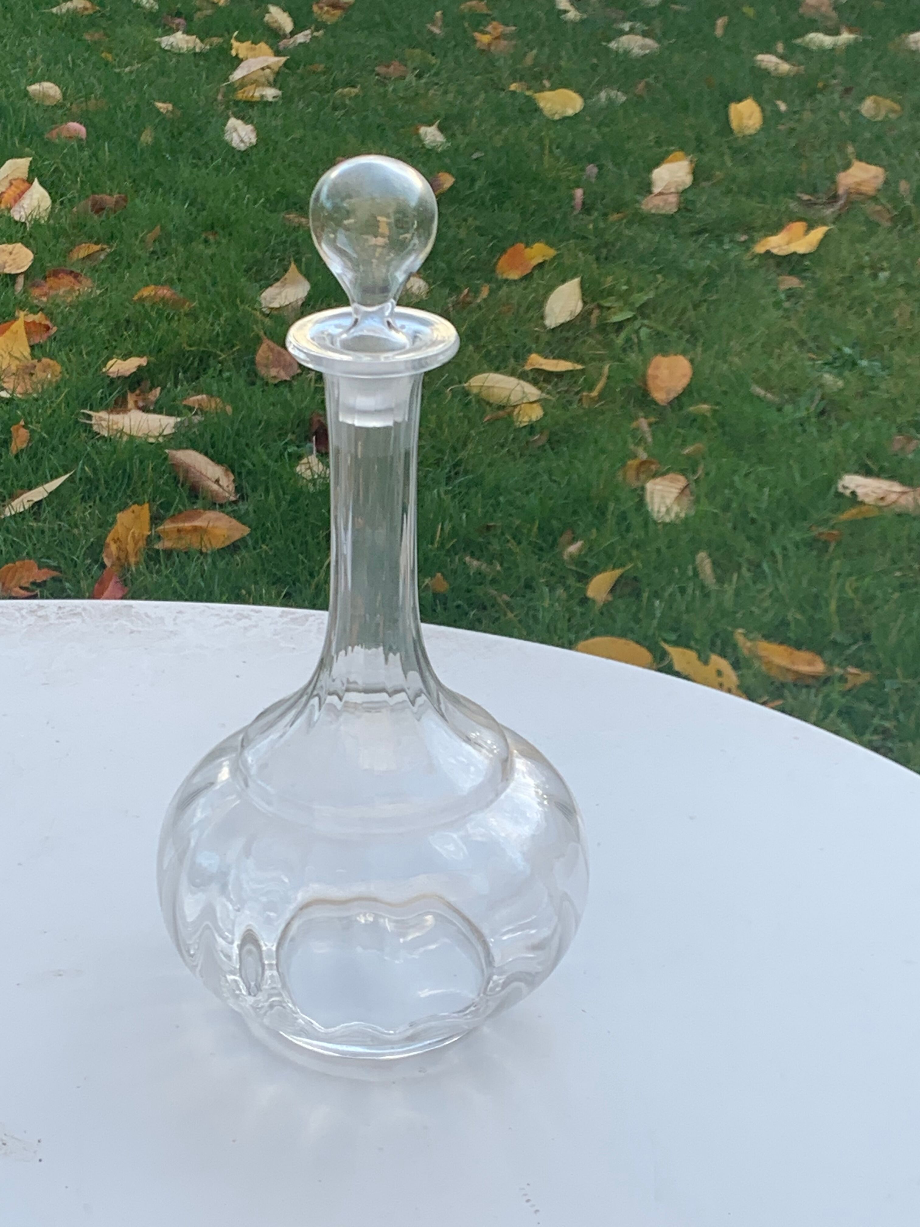 Elegant and vintage transparent glass wine decanter