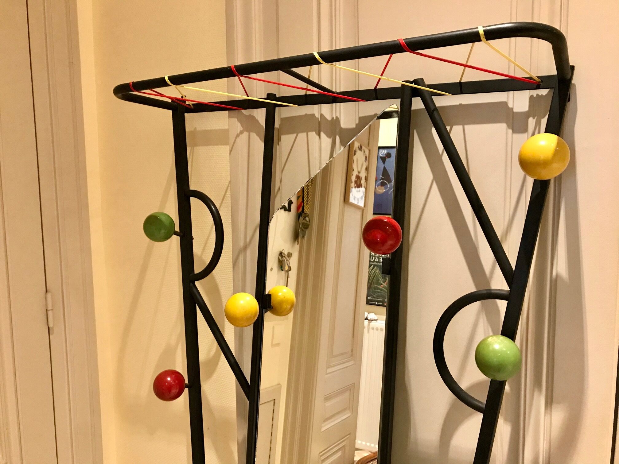 60s wall dressing room door, with colorful balls