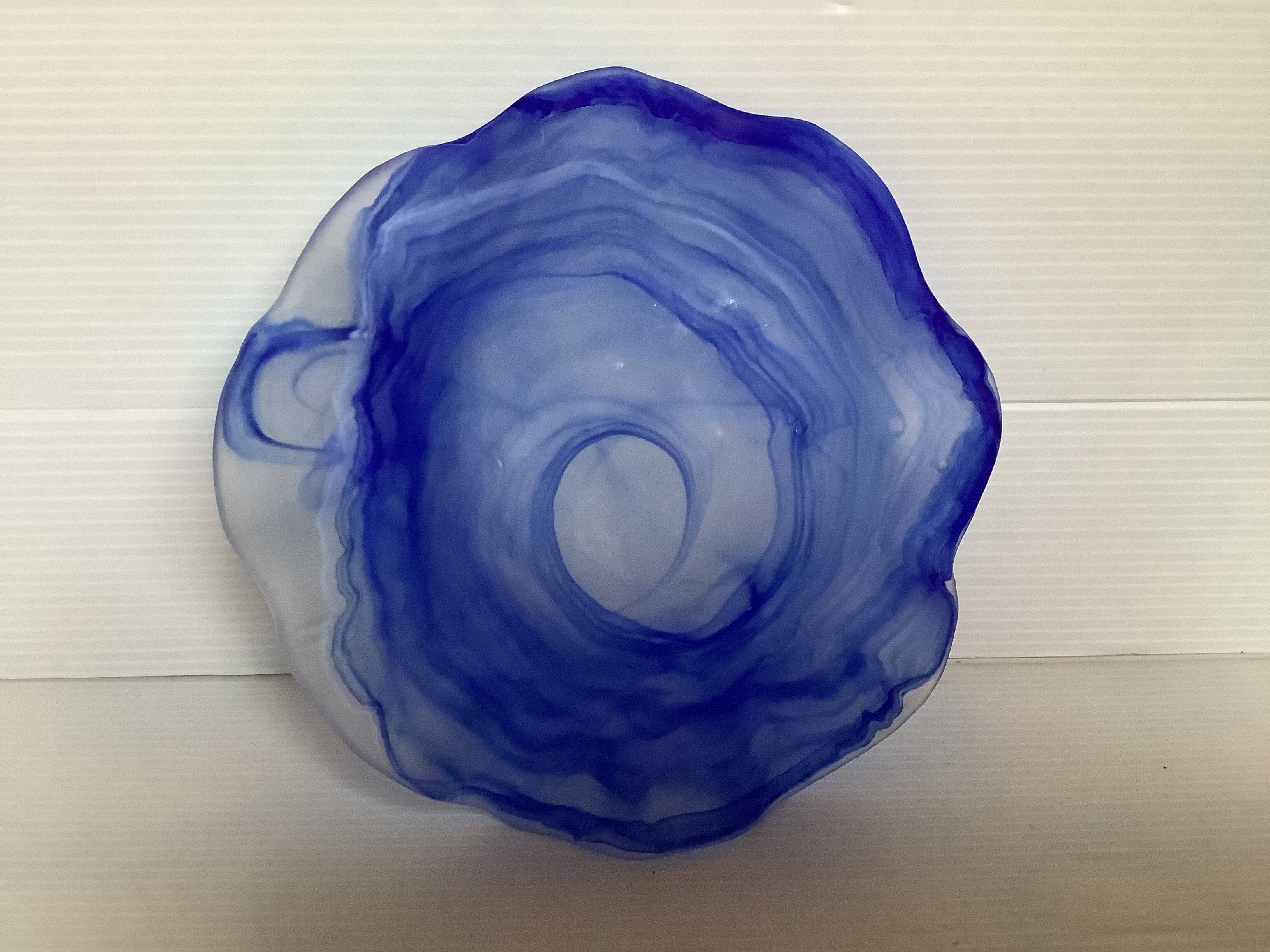 Cobalt blue glass ring with a scalloped edge