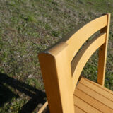 Pair of vintage folding chairs in light wood