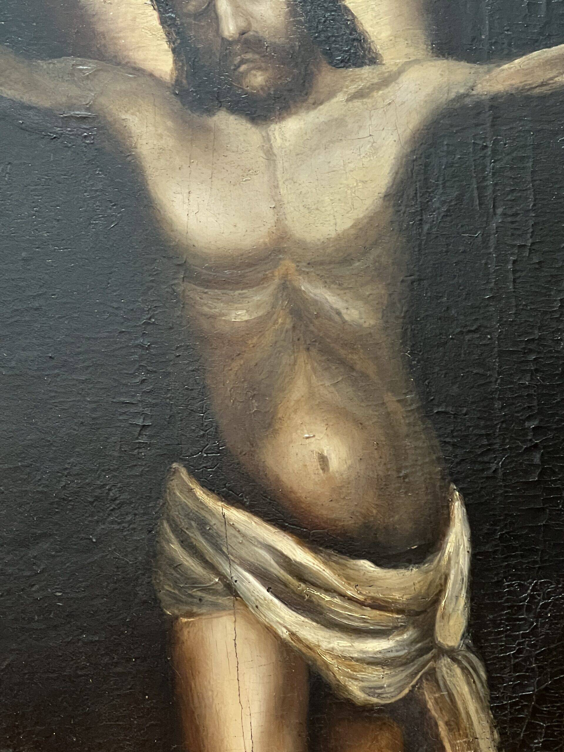 Beautiful religious work from the 17th century, oil on panel representing Christ on his cross with Mary Magdalene at his feet