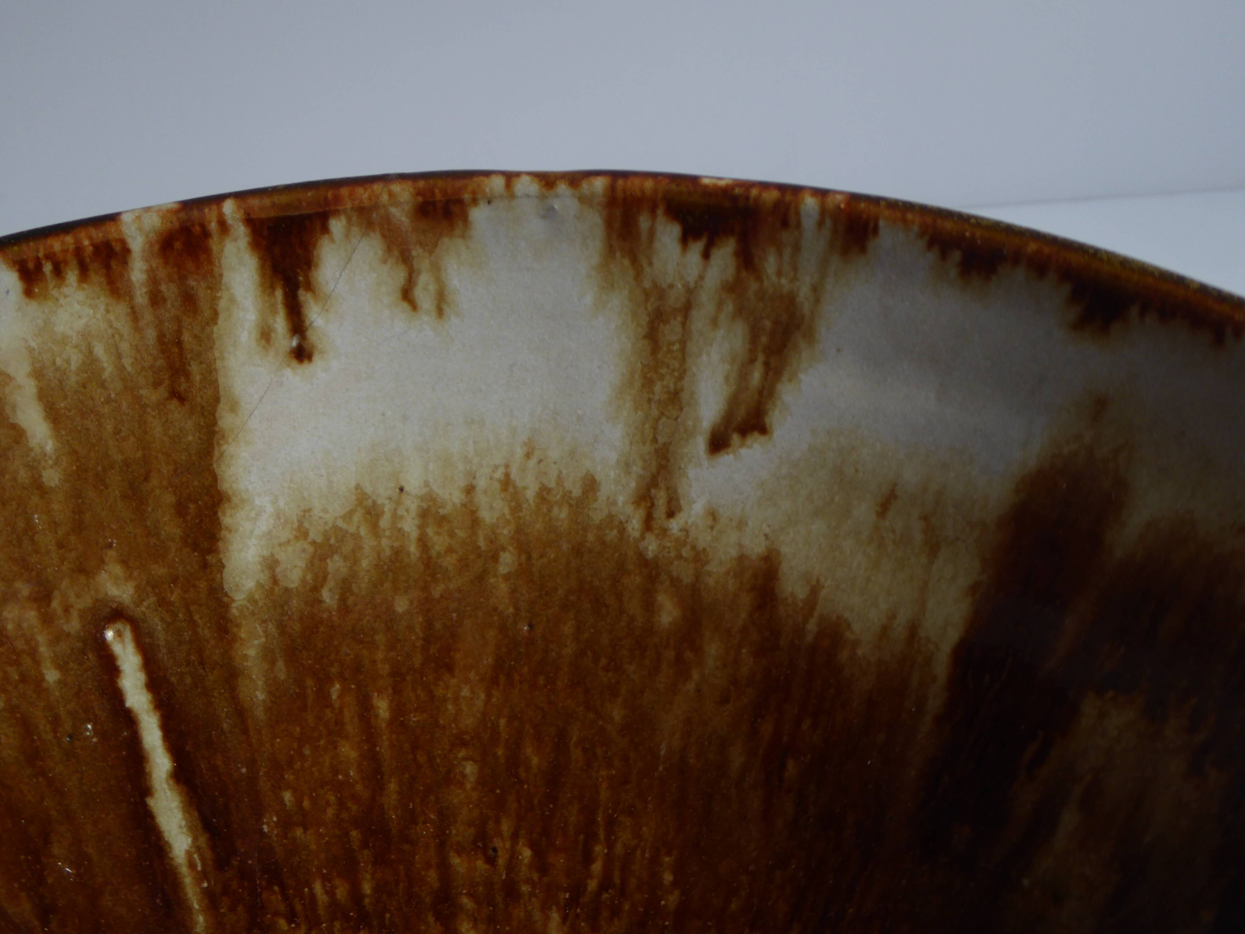 Enamelled terracotta cup