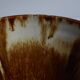 Enamelled terracotta cup