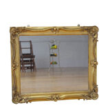 Miroir mural en bois doré du 19ème siècle