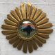 Miroir soleil, œil de sorcière, en bois doré vers 1960-70