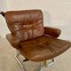Vintage mid-century Scandinavian cognac leather lounge chair by Harald Relling