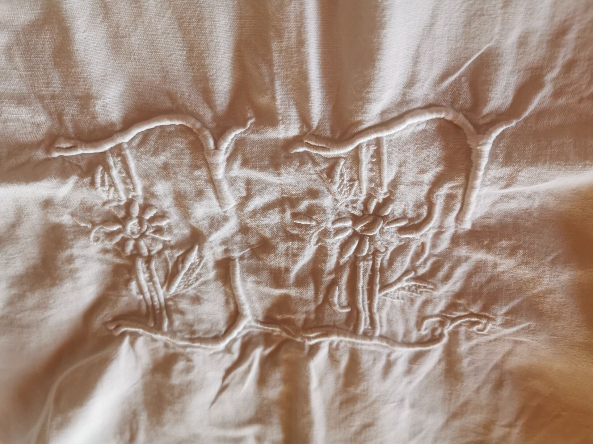 Old monogrammed fabric