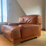 Pair of vintage armchairs Gérard Guermonprez tawny leather and stainless steel, France 1970