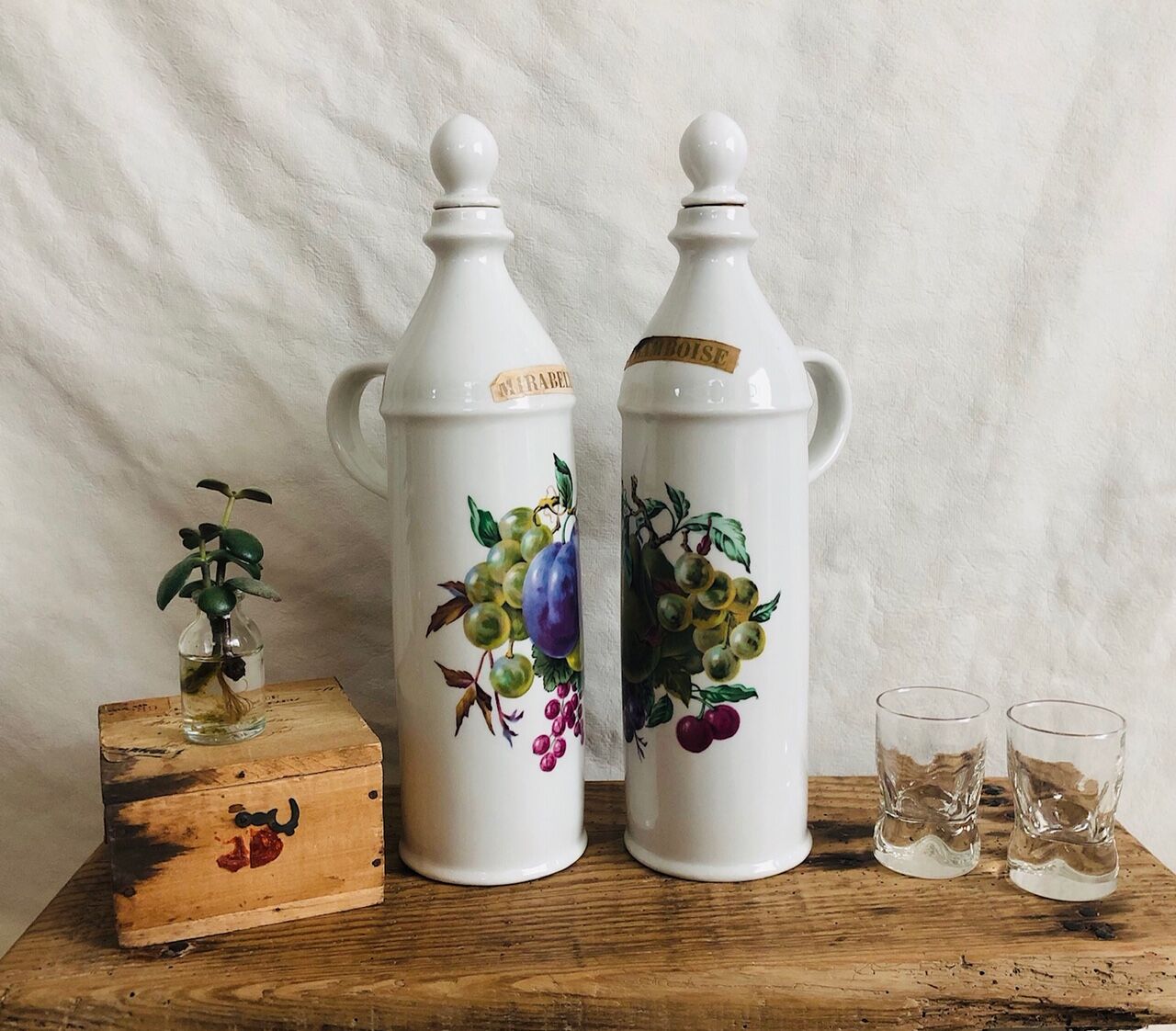 Porcelain bottle duo for mirabelle and raspberry brandy