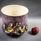 Slip planter with floral decoration