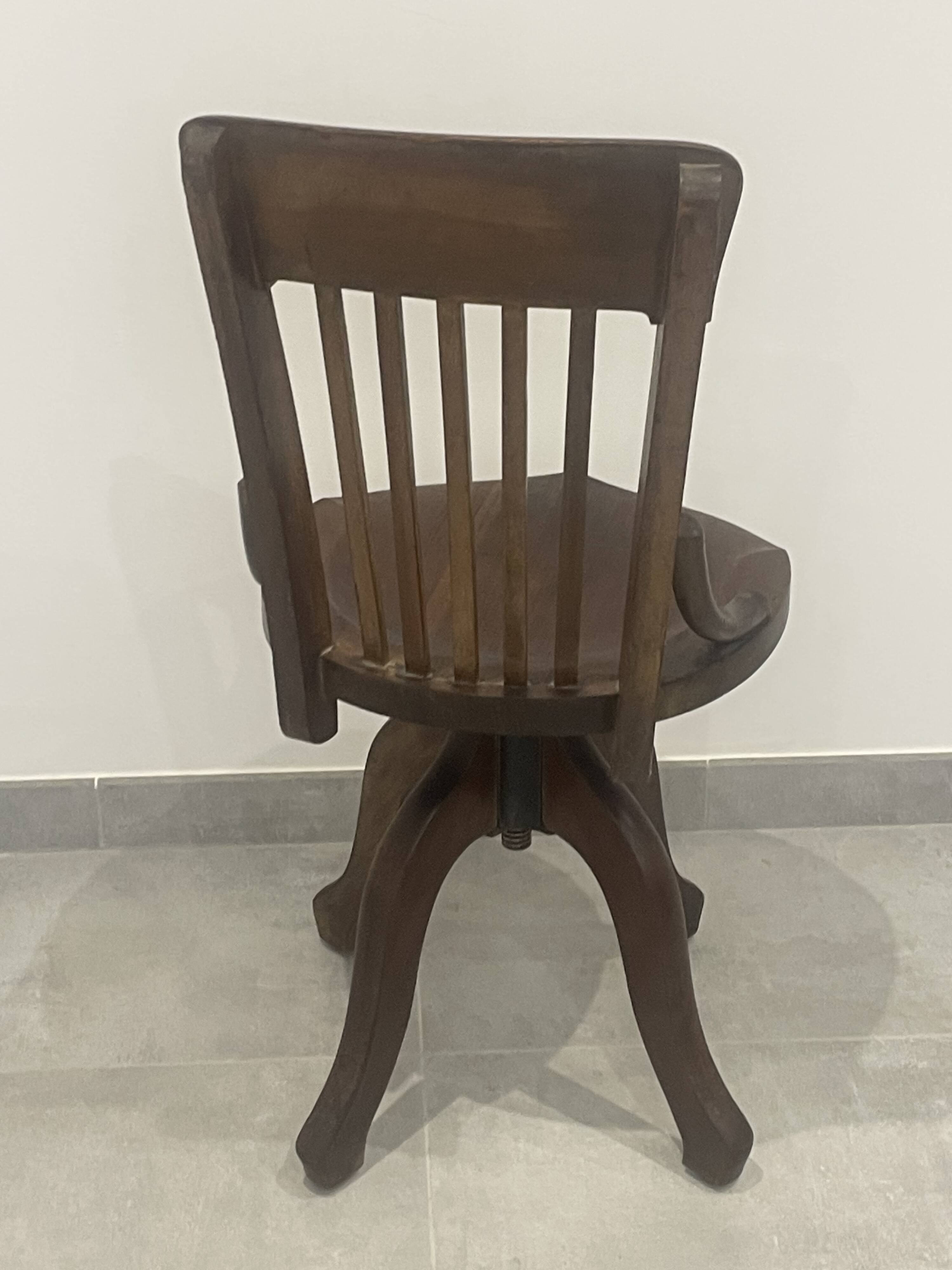 Baumann 1920 rotating office chair with adjustment screw