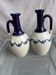 2 st Uzes tarre steel ewers