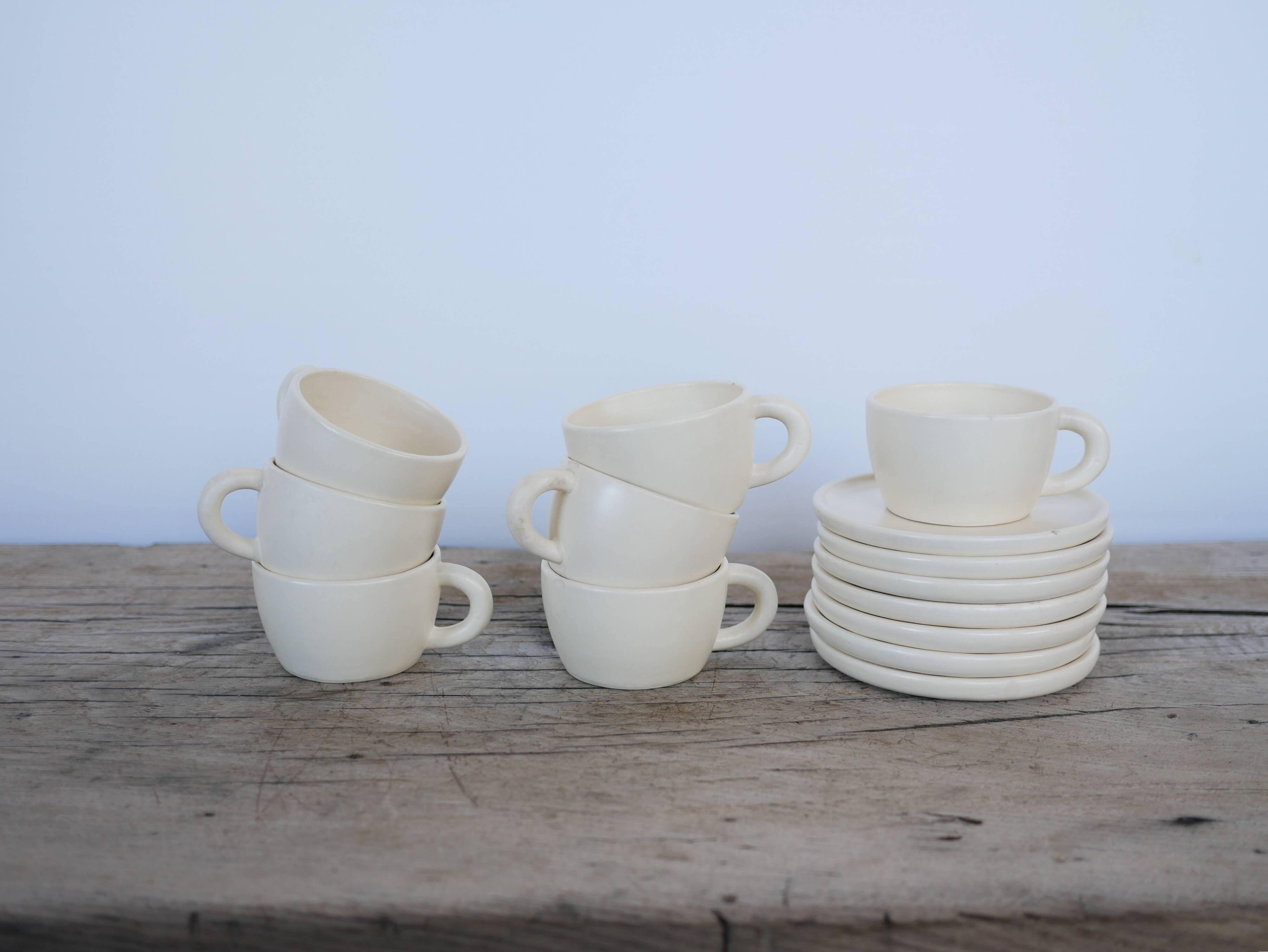 Series of 7 vintage ceramic cups and saucers by Le Pot de Terre