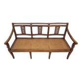 Directoire canapé in walnut with brass inlays, late 18th century.